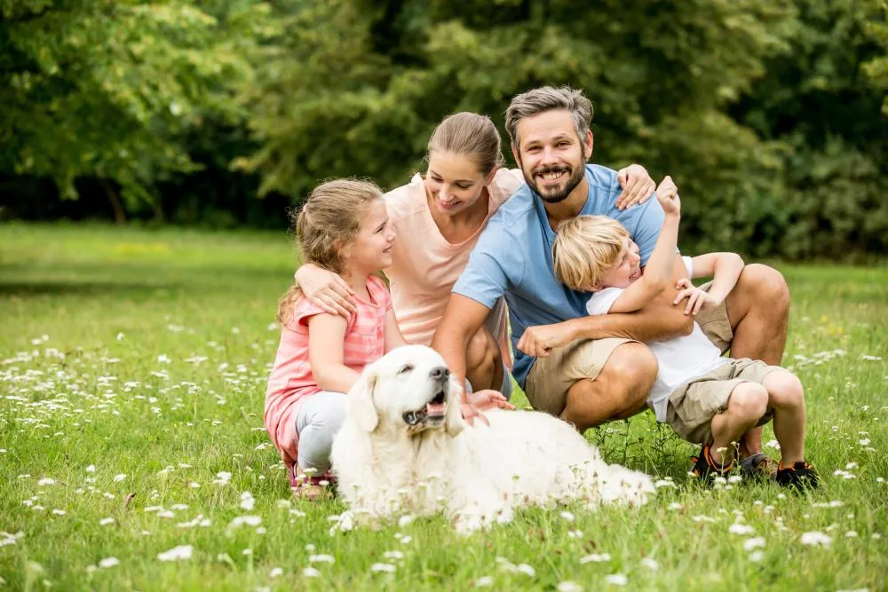 Family in Park Smiling